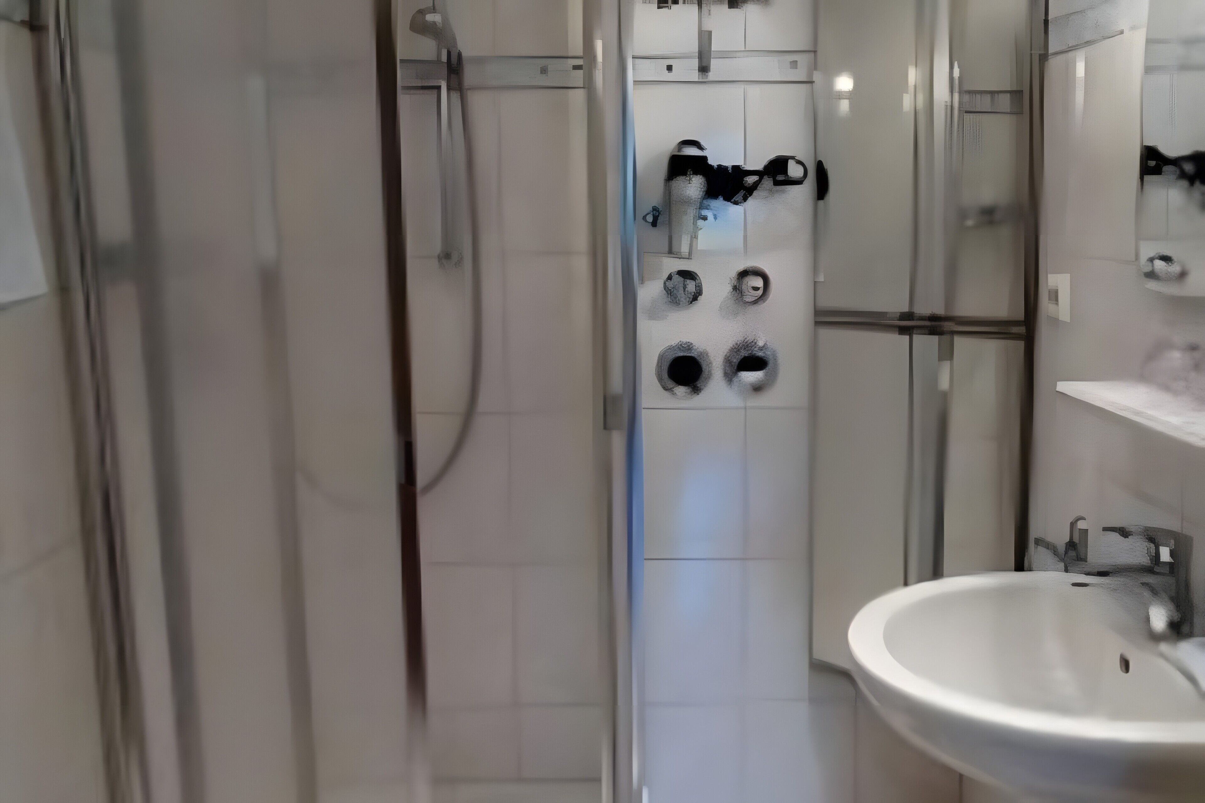 Dusj, hårføner og håndklær