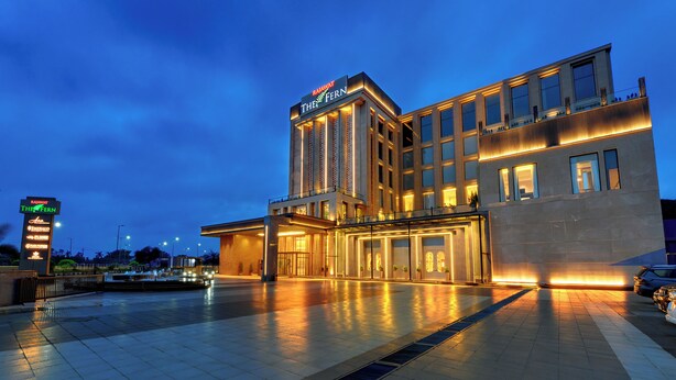 A modern hotel with a prominent sign reading "The Fern." - Rajawat The Fern An Ecotel Hotel (Akbarpur)