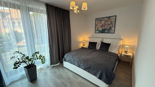 Charming 2-bedroom family-friendly apartment with WiFi and AC in Senec