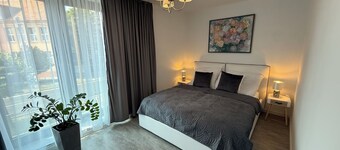 Charming 2-bedroom family-friendly apartment with WiFi and AC in Senec