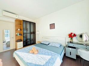 Apartment, Balcony, City View | Blackout curtains, iron/ironing board, free WiFi