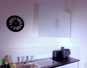 Electric kettle, toaster, cookware/dishes/utensils, spices