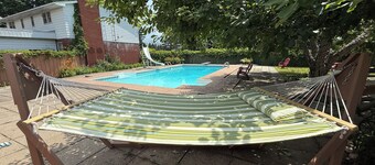Spacious Farmhouse Retreat - pet friendly, pool, deck, Orchard views, and more.