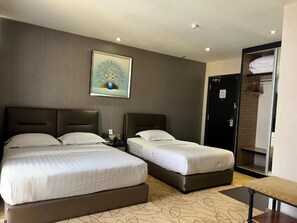 Deluxe Triple Room | Bilik Mandi | Pancuran mandi, tuala disediakan, tisu tandas 