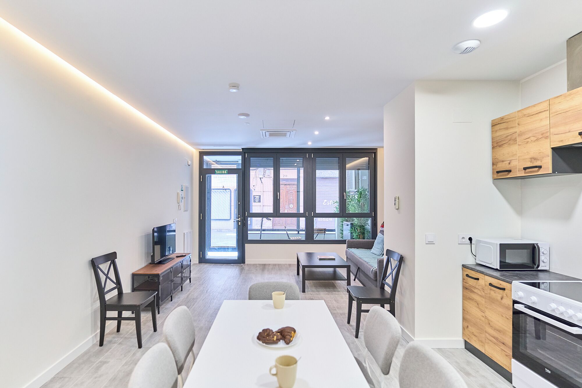 Superior Apartment | Living area | 42-inch Smart TV with digital channels