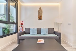 Apartamento superior | Zona de estar