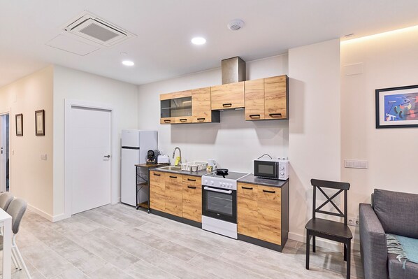 Apartment | Private kitchen | Fridge, microwave, oven, stovetop