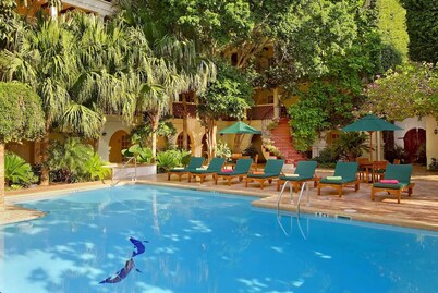 Historic Downtown Getaway | Peaceful Poolside Stay w/ Views | 3 Modern Units