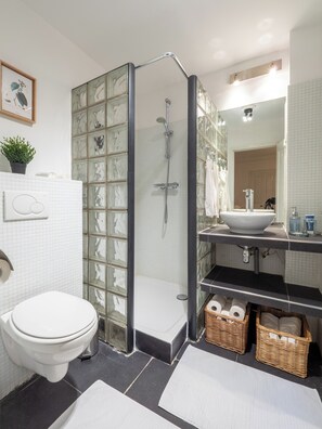 Shower, hair dryer, towels, soap