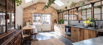 Boutique, three storey Georgian Town House, ground floor apartment with garden