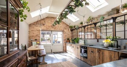 Boutique, three storey Georgian Town House, ground floor apartment with garden