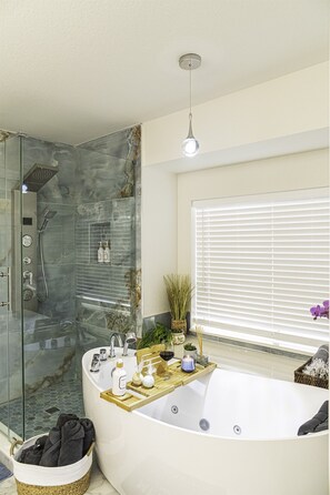 Shower, jetted tub, towels