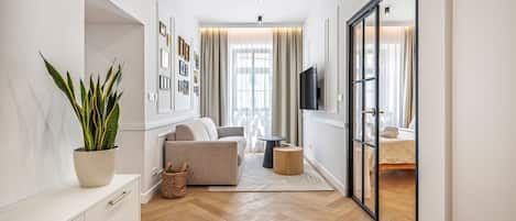 Superior-Apartment, Stadtblick | Wohnbereich
