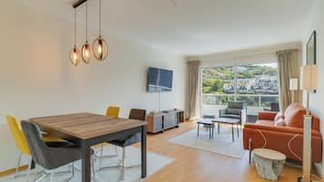 Comfort Apartment, Balcony, Mountain View | Living area | 45-inch flat-screen TV with cable channels