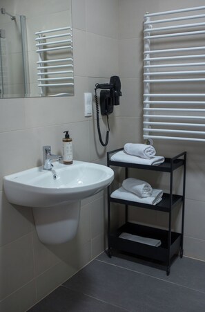 Hair dryer, towels, soap, shampoo