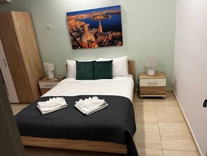 1 chambre, fer et planche Ă repasser, Wi-Fi gratuit, draps fournis