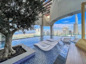 Pool - Luxury 2BR, Burj views & Infinity roof top pool (Dubai)