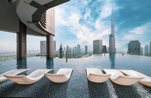Pool - Luxury 2BR, Burj views & Infinity roof top pool (Dubai)