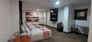 Family Room | Premium bedding, desk, free WiFi, bed sheets - Belvilla Angeles Pampanga Near Clark International Airport Formerly Boss Hotel (Angeles City)