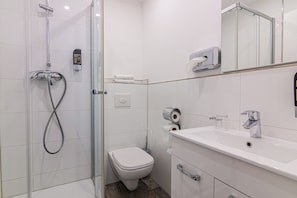 Shower, towels, soap, shampoo