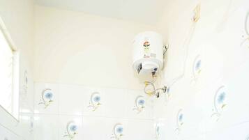 Shower, towels, soap, toilet paper