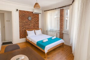 Departamento superior, balcón | Ropa de cama hipoalergénica y artículos del minibar gratis 
