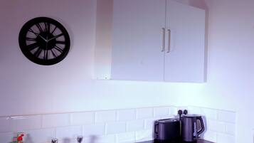 Electric kettle, toaster, cookware/dishes/utensils, spices