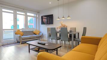 Apartment, 2 Bedrooms | Living area | Flat-screen TV