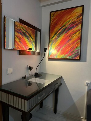 Desk, laptop workspace, blackout curtains, iron/ironing board