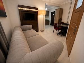 Family Suite, Balcony, City View | Desk, laptop workspace, blackout curtains, iron/ironing board - Mola Inn Uşak (Uşak)