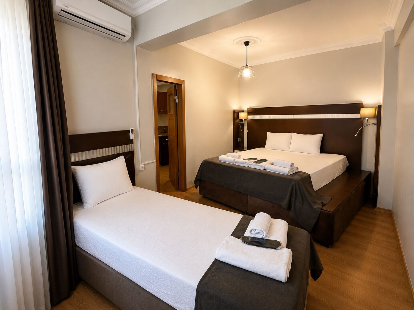 Family Suite, Balcony, City View | Desk, laptop workspace, blackout drapes, iron/ironing board (on request)