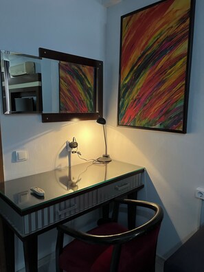 Family Suite, Balcony, City View | Desk, laptop workspace, blackout curtains, iron/ironing board