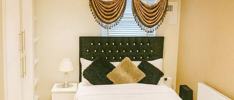 Deluxe Quadruple Room, Courtyard View | Desk, laptop workspace, iron/ironing board, free WiFi