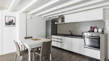 Apartment, Balcony | Private kitchen | Espresso maker, coffee/tea maker, fridge, oven