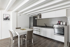 Apartment, Balcony | Private kitchen | Fridge, oven, stovetop, dishwasher