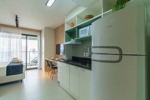 Fridge, microwave, stovetop, coffee/tea maker