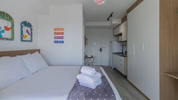 Iron/ironing board, travel crib, free WiFi, bed sheets