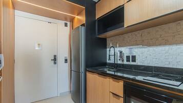 Fridge, microwave, stovetop, coffee/tea maker