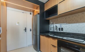 Fridge, microwave, stovetop, coffee/tea maker