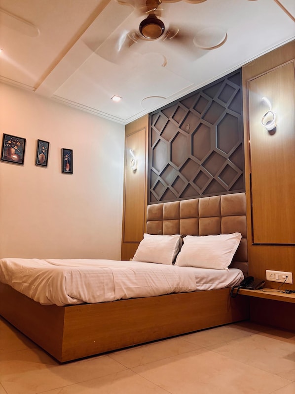 Deluxe Double Room, City View | In-room safe, desk, soundproofing, iron/ironing board
