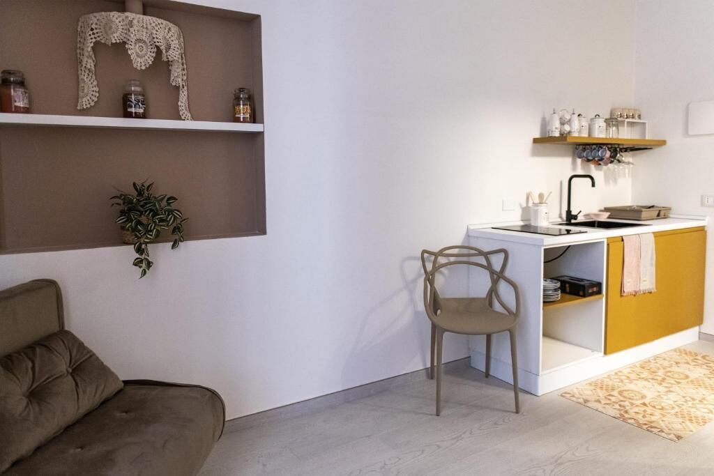 Habitación cuádruple familiar | Área de sala de estar