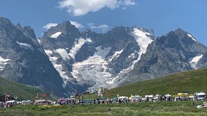 A mountainous landscape with a crowd of people and tents in the foreground, suggesting a camping or outdoor event. - Flocon 2 - One Bedroom Apartment, Sleeps 4 (Vaujany)