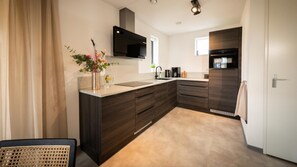 Fridge, microwave, dishwasher, coffee/tea maker
