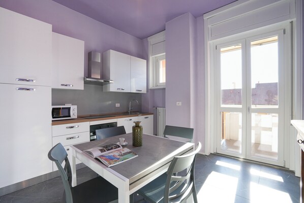 Microwave, oven, coffee grinder, cookware/dishes/utensils