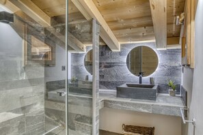 Shower, hair dryer, towels, toilet paper