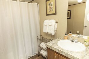 Eco-friendly toiletries, hair dryer, towels, soap