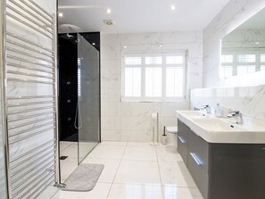 Shower, free toiletries, hair dryer, towels