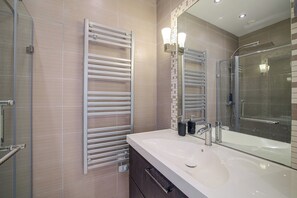 Hair dryer, bidet, towels, soap