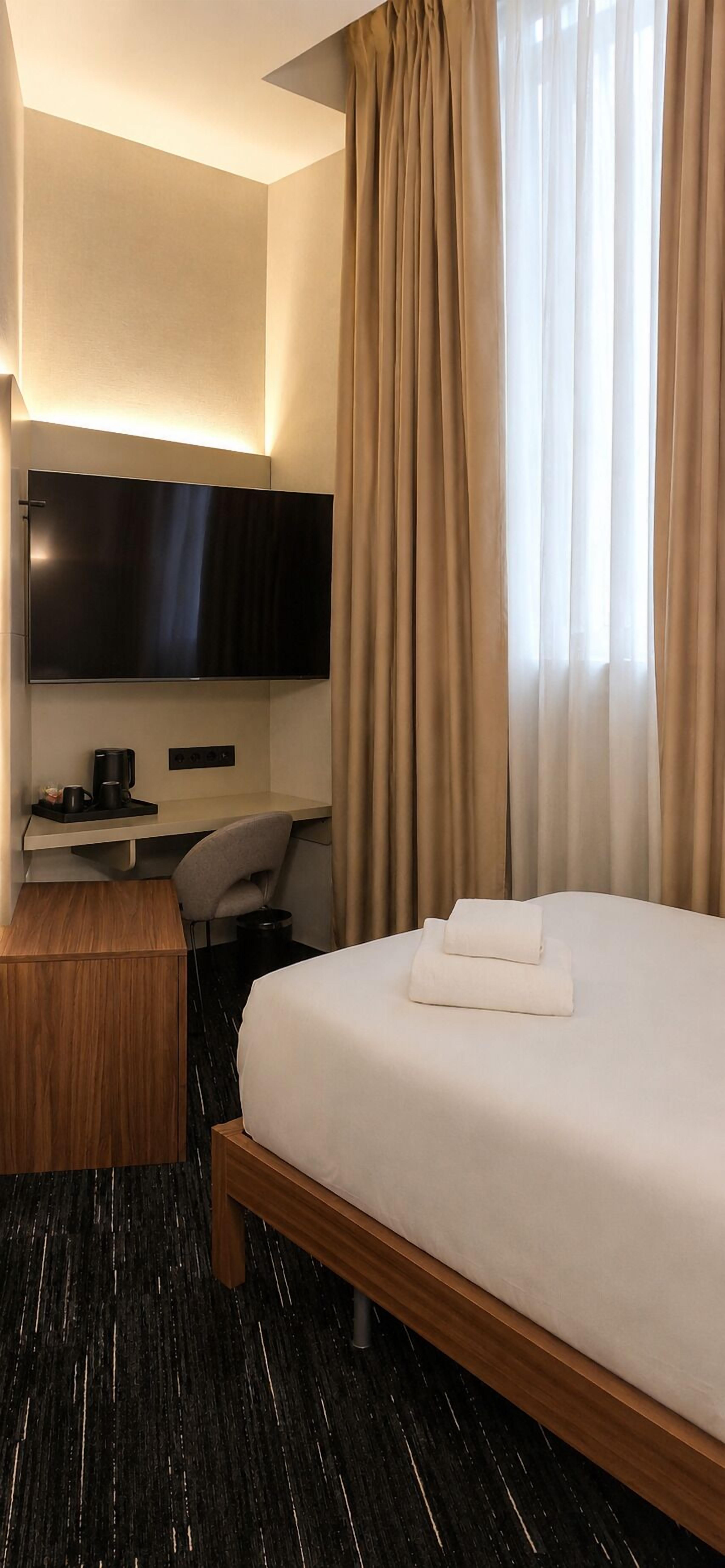 Basic Single Room | Premium bedding, down comforters, minibar, in-room safe