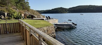 Log cabin with pool, sauna and boat by Torreby Castle | SE09080